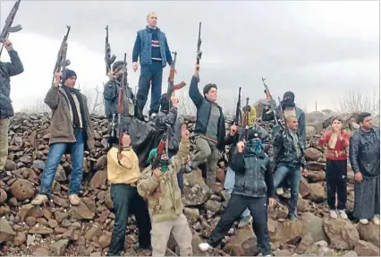  ?? Photo: REUTERS ?? Standing their ground: Syrian soldiers who defected to join the Free Syrian Army join a protest against Syria’s President Bashar al-assad in Kafranbel near Idlib yesterday.