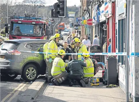  ?? Picture: Craig Stephen. ?? The driver was freed from his vehicle, treated at the scene and taken to hospital.