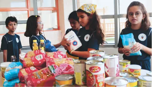  ?? Supplied ?? In Riyadh, the students at Aldenham Prep School created care packages for charity. Most of the students went grocery shopping with their families to hand-pick non-perishable goods such as dry pasta, beans, rice and canned vegetables to donate to the Charity Committee for Orphans Care, selected by the school council.