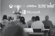  ?? VIRGINIA MAYO AP ?? Microsoft President Brad Smith speaks at a news conference about Microsoft’s acquisitio­n of Activision Blizzard.