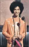  ?? AP PHOTO ?? This February 2015, file photo shows Prince presenting the award for album of the year at the 57th annual Grammy Awards in Los Angeles. Prince didn’t have an orange crush, purple was his favourite color, according to his half-sister.