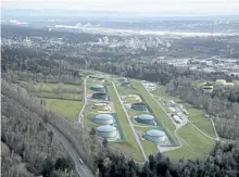  ?? JONATHAN HAYWARD/THE CANADIAN PRESS ?? Kinder Morgan Trans Mountain Expansion Project’s oil storage tank farm is seen in Burnaby, B.C., in 2016. Kinder Morgan Canada Ltd. wants the National Energy Board to clear the way for work on the Burnaby, B.C., portion of its Trans Mountain pipeline...