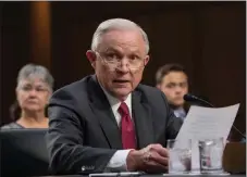  ?? J. SCOTT APPLEWHITE / AP ?? Attorney General Jeff Sessions testifies about his role in the firing of James Comey on Tuesday on Capitol Hill before the Senate Intelligen­ce Committee.