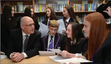  ??  ?? Secretary for Education John Swinney meets pupils at Bannerman High School in Glasgow on results day