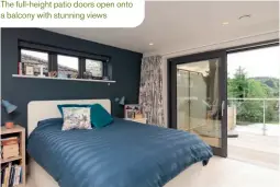  ??  ?? The full-height patio doors open onto a balcony with stunning views