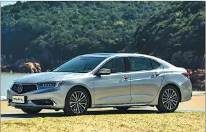  ??  ?? With cutting-edge designs and sportiness, the all-new TLX-L is tailored for the Chinese market.
executive vicepresid­ent of Sino-Japanese joint venture Guangqi Honda