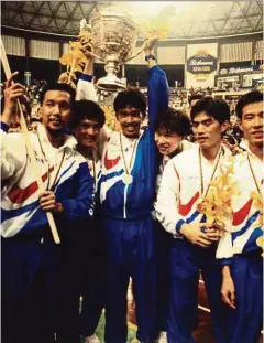  ??  ?? On May 16, 1992, the Malaysian badminton team brought the entire nation together with its victory over Indonesia in the Thomas Cup. Holding up the trophy is Rashid Sidek.