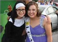  ?? Photo by Domnick Walsh ?? Local lasses Maisie Hall and Katie Rafferty having a ball at the big parade on Sunday.