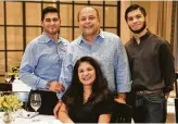  ??  ?? Owners Louis and Trish Galvan and sons Nick Galvan, left, and Jacob Gutierrez have moved Irma’s Southwest to the luxury high-rise Catalyst.