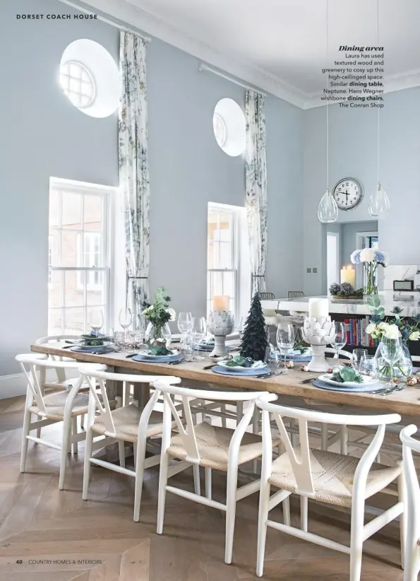  ??  ?? Dining area
Laura has used textured wood and greenery to cosy up this high-ceilinged space. Similar dining table,
Neptune. Hans Wegner wishbone dining chairs, The Conran Shop