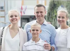  ?? Picture: AP/FILE ?? Russian opposition leader Alexei Navalny, with his wife Yulia, right, daughter Daria, and son Zakhar pose for the media after voting during a city council election in Moscow, Russia, on September 8, 2019. Alexei Navalny, the fiercest foe of Russian President Vladimir Putin who crusaded against official corruption and staged massive anti-Kremlin protests, died in prison on Friday, February 16, 2024 Russia’s prison agency said. He was 47.