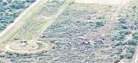 ?? — AFP photo ?? Picture showing the wreckage of a plane that crashed with 97 passengers and four crew on board on take off at the airport of Durango, in northern Mexico.