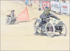  ?? ?? Cole Bernier, from Kelowna, British Columbia, leads his heat of Adaptive Men Dual Slalom at the Sea Otter Classic.