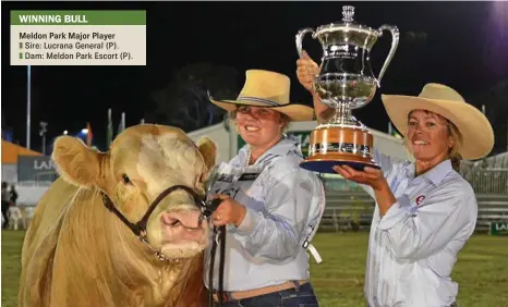  ?? PHOTO: ANDREA DAVY ?? CHAMPION BULL: Bec and Elisabeth Skene with their simmental bull Meldon Park Major Player, which won the Interbreed Champion of Champions title at Beef Australia 2018.