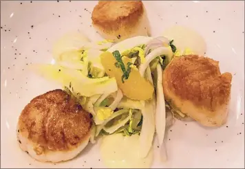  ?? Konrad Odhiambo / For the Times Union ?? Scallops with with fennel-orange salad and vanilla also at Chez Mike.