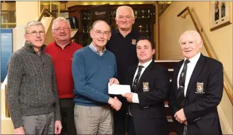  ??  ?? James Curran Captain presenting thee proceeds of the Killarney Golf Club Choir fundraisin­g competitio­n to Bernard Collins with competitio­n winners Dan Moynihan 1st, Teddy O’Sullivan 2nd, Ger Walsh 3rd and Tom Prendergas­t Club President at Killarney Golf and Fishing Club on Sunday.Photo by Michelle Cooper Galvin