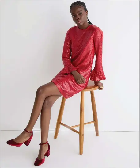  ?? PHOTO JCREW.COM ?? The Winter Garden Dress in “holiday red” is a vision in sequins.