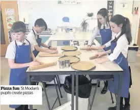  ??  ?? Pizza fun St Modan’s pupils create pizzas