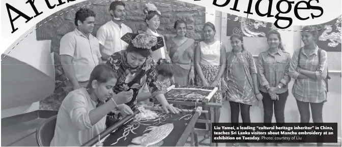  ?? Photo: courtesy of Liu ?? Liu Yamei, a leading “cultural heritage inheritor” in China, teaches Sri Lanka visitors about Manchu embroidery at an exhibition on Tuesday.