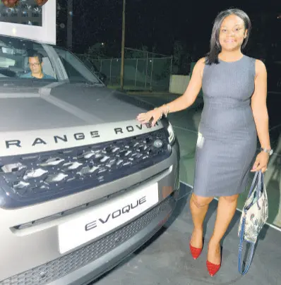  ??  ?? Sashein Chin stands boldy by the vehicle of her dreams, the 2020 Range Rover Evoque.