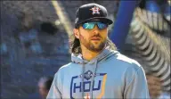  ?? Karen Warren / Houston Chronicle ?? Houston Astros center fielder Jake Marisnick warms up before Game 3 of the American League Championsh­ip Series at Yankee Stadium in New York on Oct. 15. Marisnick, now a Met, apologized on Friday for his role in the Astros’ sign-stealing scandal.