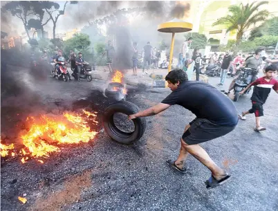  ?? AFP ?? Nine soldiers and nine civilians were injured as a result of riots, which erupted in the backdrop of economic crisis.