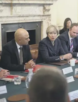  ??  ?? Theresa May hosts a meeting in Downing Street yesterday after returning from Brussels where she met European Commission president Jean-claude Juncker, right