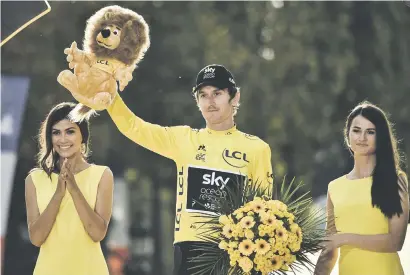  ?? Picture: AFP ?? PROUD. Geraint Thomas became only the third Briton to win the Tour de France on Sunday.