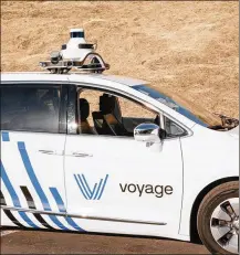  ?? IAN C. BATES / THE NEW YORK TIMES ?? Voyage tests its self-driving car in San Jose, Calif. Michigan is working with private partners to run autonomous vehicles with human backup drivers along I-94.