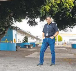  ?? KRISTIAN CARREON PHOTOS ?? Principal Luis Aparicio stands Friday in the common area of Hilltop Middle School, where he would supervise students during breaks.