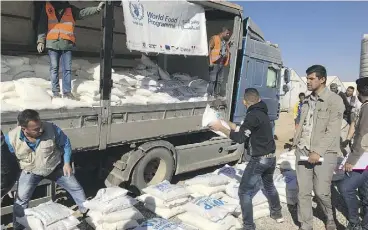  ?? MATTHEW FISHER / POSTMEDIA NEWS ?? Samaritan’s Purse at work in Iraq. The NGO’s Canadian wing is helping the country’s Yazidi minority, brutalized by Islamic State, try to put their lives back together.