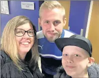  ??  ?? Young Harvey Priest who is battling leukaemia has been getting support from all quarters with football gear gifts and special visits including taking a trip to the Leicester City training ground