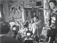  ?? PHOTOS PROVIDED TO CHINA DAILY ?? Clockwise from top: Masked dancers perform at Damkar Monastery in Qinghai province, telling the story of the Lotus-Born Master; the film production team interviews Choeze Kuchen Rinpoche, an expert on the life of the Lotus-Born Master; Laurence Brahm follows in the footsteps of the Buddhist monk exploring myths revolving around the legendary figure.