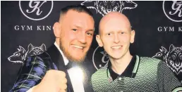  ??  ?? Celebrity fan Darren with MMA fighter Conor Mcgregor