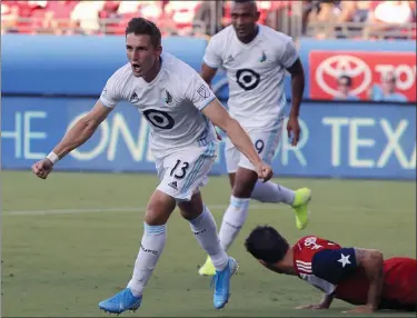  ?? TONY GUTIERREZ — THE ASSOCIATED PRESS ?? Minnesota United’s Ethan Finlay (13) and Angelo Rodriguez, rear left, celebrate Finlay’s goal against FC Dallas during a 2019 match.