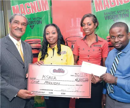  ?? RUDOLPH BROWN ?? Roxanne Brown (second left), branch manager of Charles Chocolate, and Tamika West, marketing manager of Magnum, present sponsors cheque to Ambassador Stewart Stephenson (left), president of KSAFA, and Dwayne Dillon (right), assistant, general secretary...