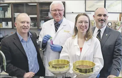  ?? JoNatHaN riley/ truro Daily News ?? Dr. Derek Lynch, of the Soil Health Lab; MP for Cumberland-Colchester, Bill Casey; graduate student Carolyn Mann, and Dean David Gray of the Faculty of Agricultur­e announced a $1.7 million project researchin­g soil health and climate change.