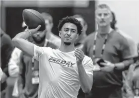  ?? Vasha Hunt/associated Press ?? Bryce Young works on passing drills during Alabama’s pro day on Thursday in Tuscaloosa, Ala.