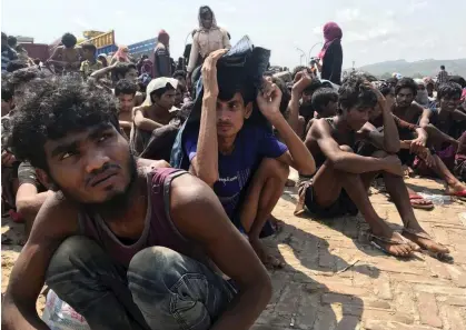  ?? Photograph: Suzauddin Rubel/AP ?? Rohingya refugees near Cox's Bazar in Bangladesh. The UN special rapporteur found people in a ‘state of desperatio­n’ on a recent visit.