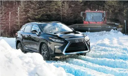  ??  ?? An all-new 2016 Lexus RX 350 AWD, boasting new styling inside and out, more power and a long list of added content, shows its stuff in an AWD driving exercise on the snows of Le Massif de Charlevoix in Quebec.