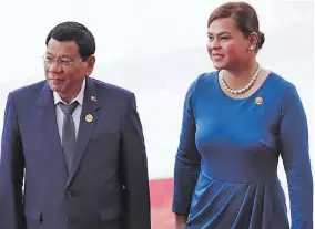  ?? Photo: AFP ?? President Rodrigo Duterte and his daughter Sara Duterte.