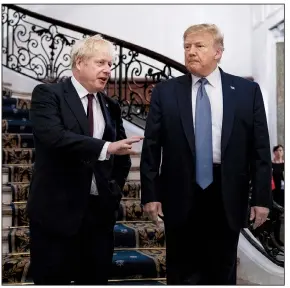  ?? The New York Times/ERIN SCHAFF ?? British Prime Minister Boris Johnson (left) and President Donald Trump speak to reporters Sunday before a breakfast meeting on the sidelines of the Group of Seven summit in Biarritz, France.