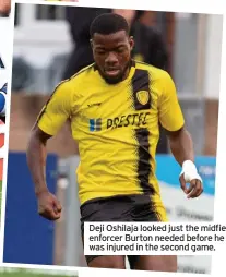  ?? ?? Deji Oshilaja looked just the midfield enforcer Burton needed before he was injured in the second game.