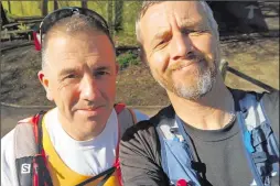  ??  ?? Ashford and District Road Runners Mark Attenborou­gh and Rick Holden before the Medway Megalith Marathon