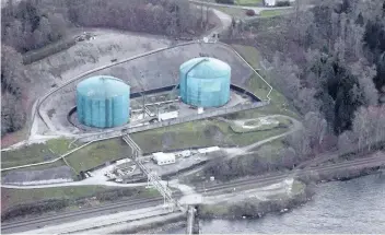  ?? JONATHAN HAYWARD/THE CANADIAN PRESS ?? Kinder Morgan Trans Mountain Expansion Project’s Westeridge loading dock is seen in Burnaby, B.C., in 2016. Scotiabank says the current discount to Canadian crude because of a lack of oil pipeline space is costing the economy roughly $15.6 billion a...