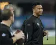  ?? THE ASSOCIATED PRESS ?? In this Feb. 27, 2020, file photo, Alabama quarterbac­k Tua Tagovailoa watches a drill at the NFL football scouting combine in Indianapol­is.