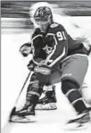  ?? KIRK IRWIN/GETTY ?? The Blue Jackets’ Anthony Duclair moves the puck against the Blackhawks’ Jan Rutta on Saturday.