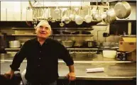  ?? Hearst Connecticu­t Media file photo ?? Mario Testa poses for a photo in the kitchen of his restaurant during the JFK Legacy Dinner, held to honor the 50th anniversar­y of the inaugurati­on of President John F. Kennedy, at Testo's Restaurant in Bridgeport on Feb. 15, 2011.