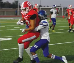  ?? DAVID WITTE/NEWS-SENTINEL ?? Galt wide receiver Marcelo Lopez (33) catches a pass near the sideline during the Warriors' 35-34 victory over Valley on Sept. 6.