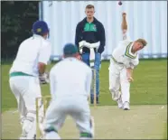  ?? Picture: Gary Browne FM4320675 ?? Ashford Town 2nds’ James Rodway sends down a delivery against Nonington 2nds